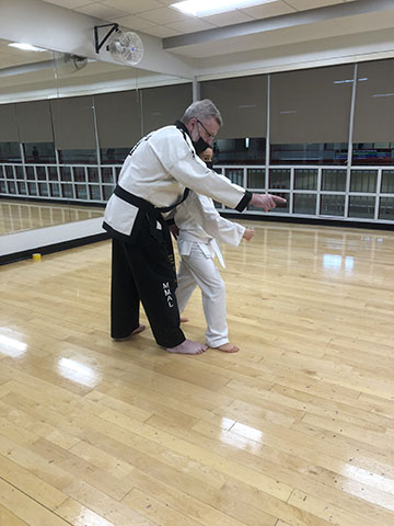 instructor helping student